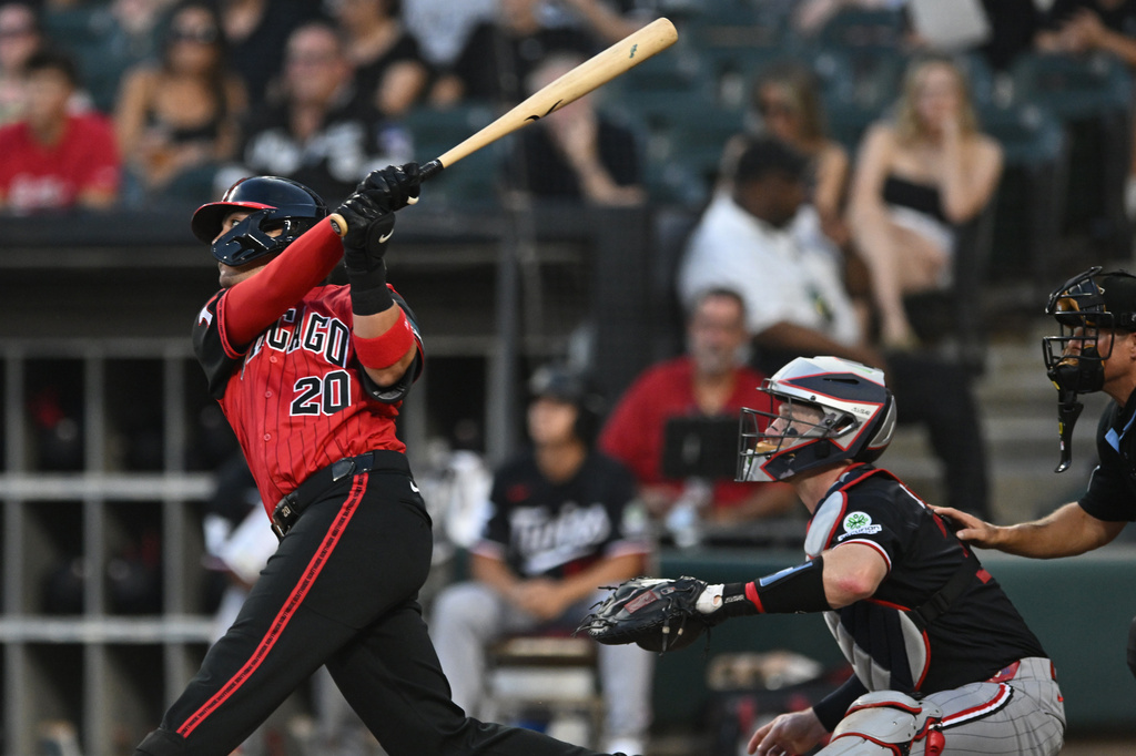 Chicago White Sox's Miguel Vargas watches his solo home run during the first inning of a baseball game against the Minnesota Twins Friday, Sept. 4, 2026 in Chicago. (AP Photo/Paul Beaty)