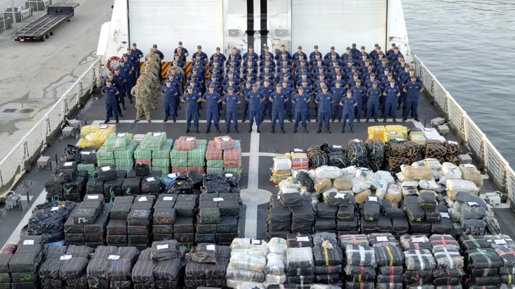 This still image from video and provided by the U.S. Coast Guard show crew members aboard the. US Coast Guard Cutter Hamilton after offloading illicit narcotics at Port Everglades, Fla., Monday, Aug. 25, 2025. (U.S. Coast Guard via AP)