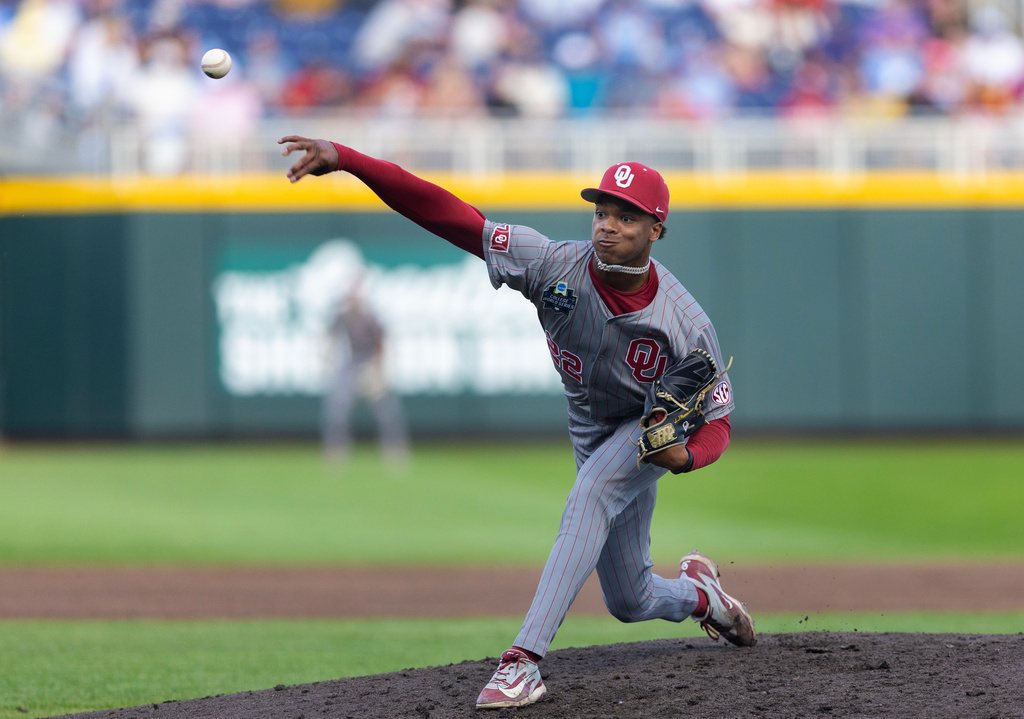 Oklahoma's LJ Mercurius pitches against North Carolina in the third inning of Game 3 of the NCAA College World Series baseball finals in Omaha, Neb., Monday, June 22, 2026. (AP Photo/Rebecca S. Gratz)