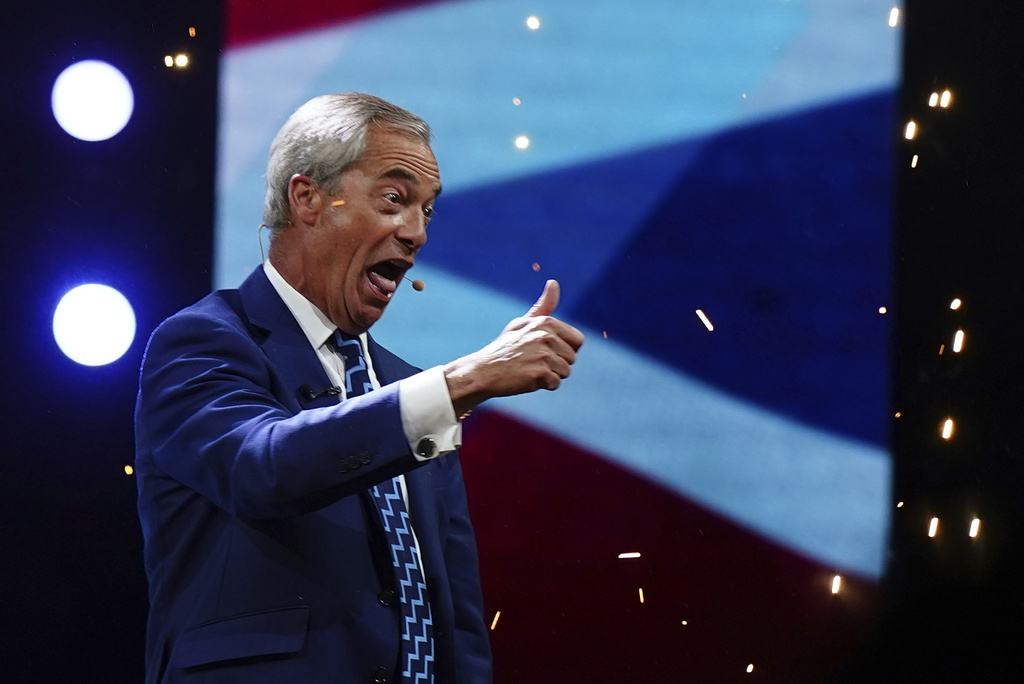 Britain's Reform UK party leader Nigel Farage speaks during the party's annual conference at the National Exhibition Centre in Birmingham, England, Friday Sept. 5, 2025. (Jacob King/PA via AP)