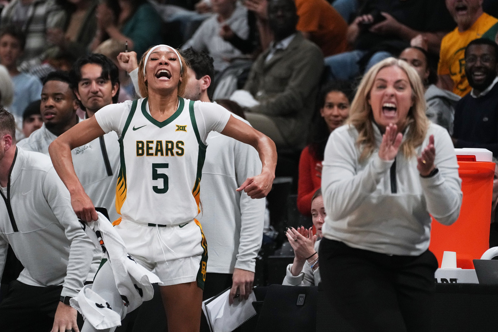 Baylor forward Darianna Littlepage-Buggs (5) and head coach Nicki Collen react against the Duke in the second half of an NCAA college basketball game Monday, Nov. 3, 2025 in Paris. (AP Photo/Thibault Camus)