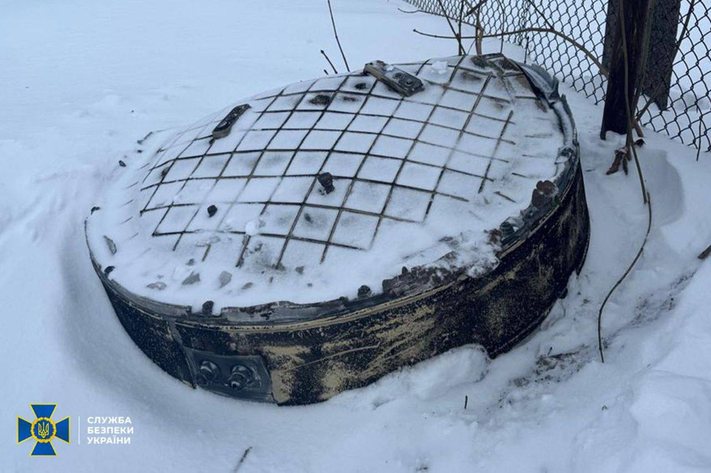 This photo provided by the Ukrainian Security Service on Friday, Jan. 9, 2026, shows a fragment believed to be a part of a Russian Oreshnik intermediate range hypersonic ballistic missile that hit the Lviv region. (Ukrainian Security Service via AP)