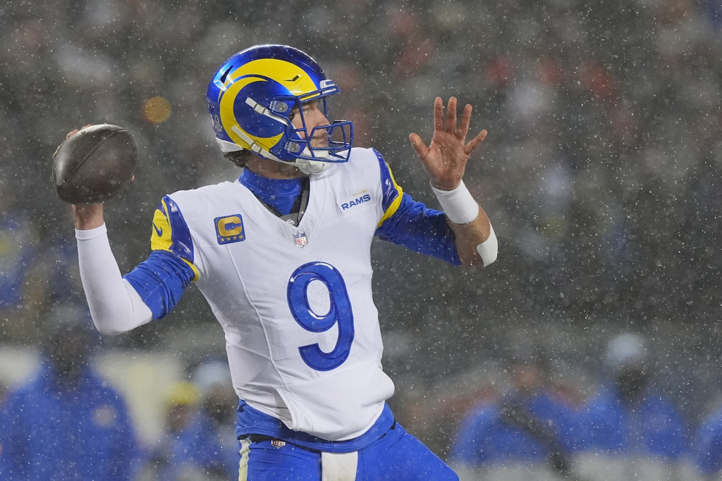 Los Angeles Rams quarterback Matthew Stafford throws a pass against the Chicago Bears during the first half of an NFL football divisional playoff game Sunday, Jan. 18, 2026, in Chicago. (AP Photo/Nam Y. Huh)