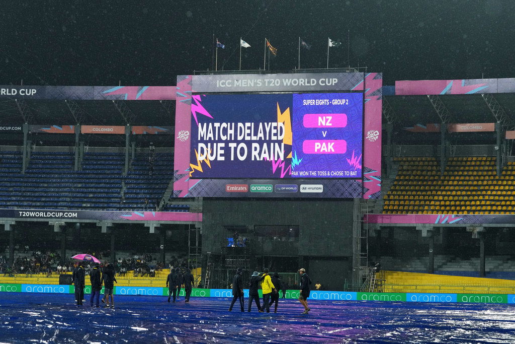 A large screen announces a delay in the start of T20 World Cup cricket match between New Zealand and Pakistan due to rain, in Colombo, Sri Lanka, Saturday, Feb. 21, 2026. (AP Photo/Eranga Jayawardena)