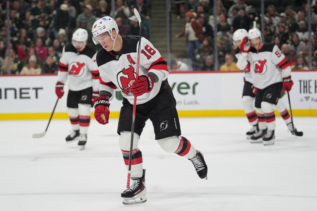 New Jersey Devils left wing Ondrej Palat (18) skates after scoring during the second period of an NHL hockey game against the Minnesota Wild, Monday, Jan. 12, 2026, in St. Paul, Minn. (AP Photo/Abbie Parr)