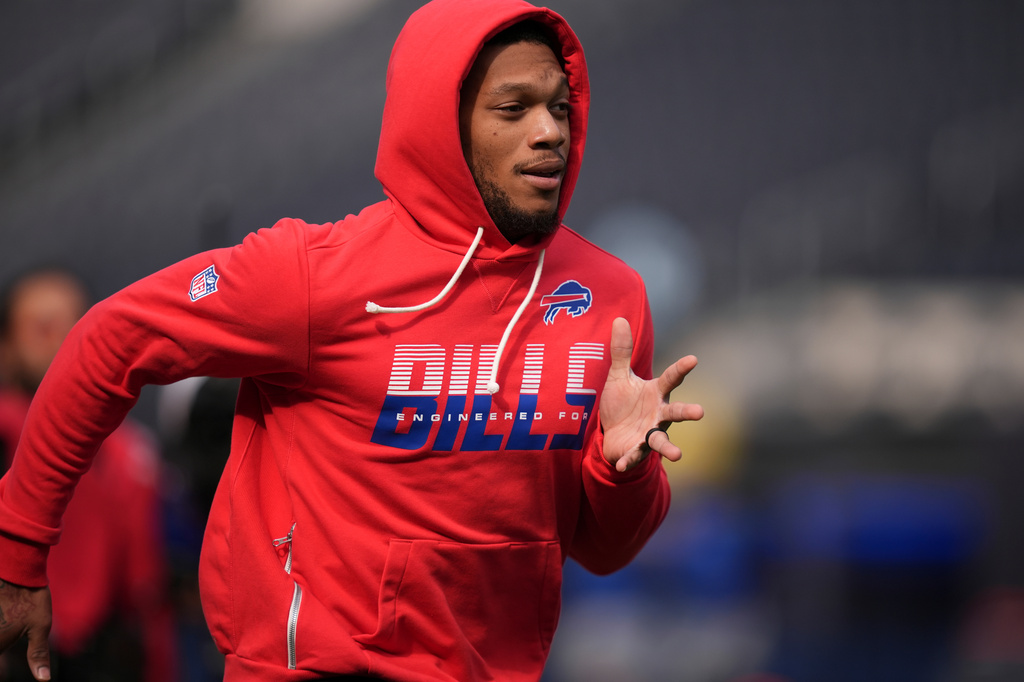 Buffalo Bills wide receiver DJ Moore warms up prior to an NFL football game against the Los Angeles Rams, Monday, Oct. 12, 2026, in Inglewood, Calif. (AP Photo/Gregory Bull)