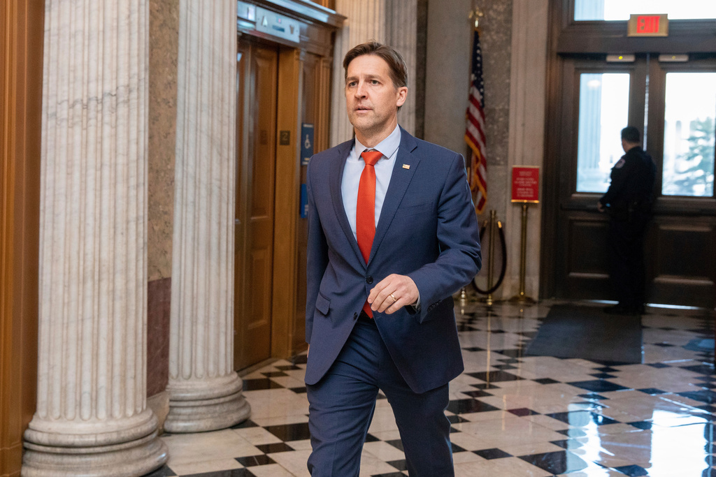 FILE - Sen. Ben Sasse, R-Neb., walks the halls of the Capitol in Washington, Wednesday, Jan. 19, 2022. (AP Photo/Amanda Andrade-Rhoades, File)
