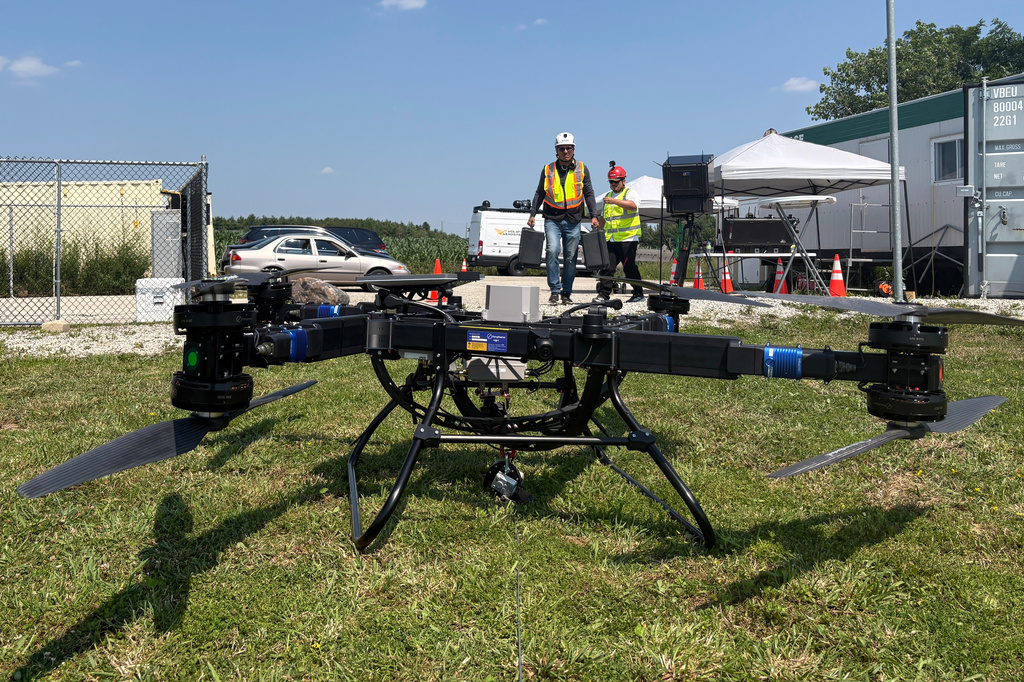 Volatus Aerospace workers prepare a heavy lift drone for testing on July 13, 2026, in Kleinburg, Ontario. (AP Photo/Kelvin Chan)