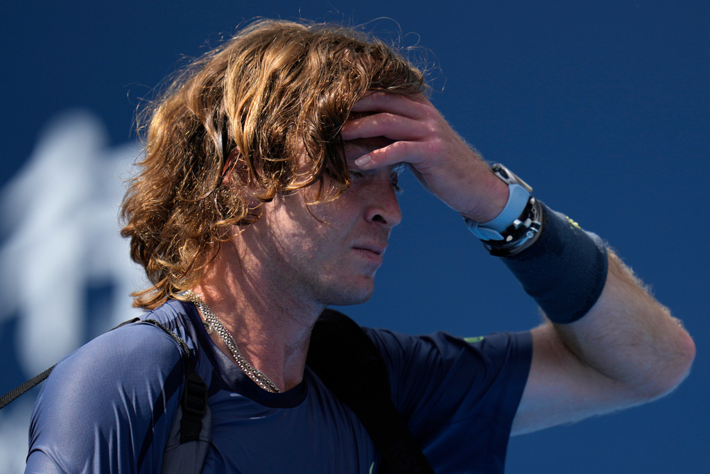 Andrey Rublev reacts after losing to Flavio Cobolli of Itay in a men's singles match for the China Open tennis tournament in Beijing, China, Friday, Sept. 26, 2025. (AP Photo/Ng Han Guan)