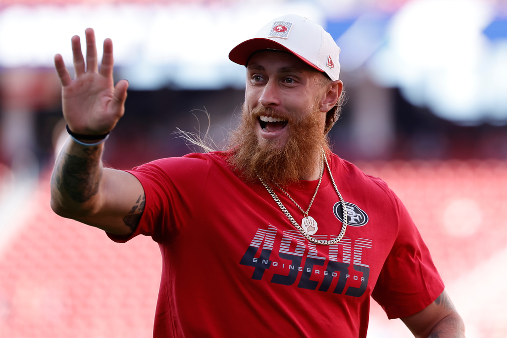 San Francisco 49ers tight end George Kittle waves before a preseason NFL football game against the Tennessee Titans, Thursday, Aug. 13, 2026, in Santa Clara, Calif. (AP Photo/Kelley L. Cox)