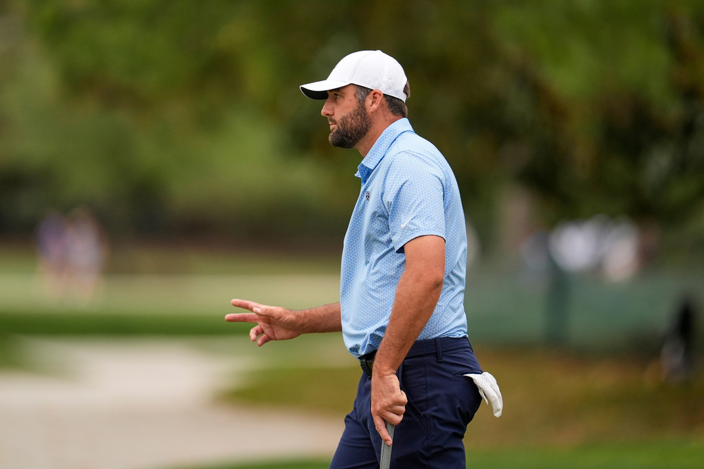 Scottie Scheffler celebrates his putt on the 16th hole during the final round of the RBC Heritage golf tournament Sunday, April 19, 2026, in Hilton Head, S.C. (AP Photo/Mike Stewart)
