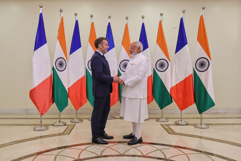 Indian Prime Minister Narendra Modi, right, welcomes French President Emmanuel Macron in Mumbai, India, Tuesday, Feb.17, 2026. (Indian Prime Minister Office via AP)