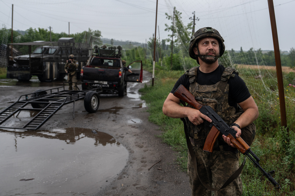 In this photo provided by Ukraine's 93rd Kholodnyi Yar Separate Mechanized Brigade press service, a Ukrainian serviceman watches an FPV drone in the frontline city of Druzhkivka, Donetsk region, Ukraine Friday, July 10, 2026. (Iryna Rybakova/Ukraine's 93rd Mechanized Brigade via AP)