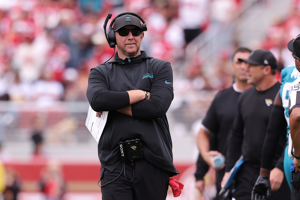 Jacksonville Jaguars head coach Liam Coen reacts toward an official near the sideline during the first half of an NFL football game against the San Francisco 49ers in Santa Clara, Calif., Sunday, Sept. 28, 2025. (AP Photo/Kelley L. Cox)