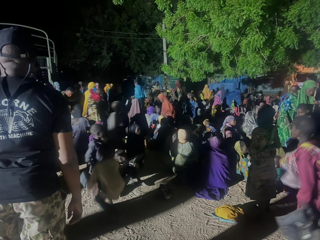 In this photo released by Nigerian Army, freed women and children that were abducted by Boko Haram in southern Borno, Nigeria. Saturday, June 6, 2026. (Nigerian Army via AP)