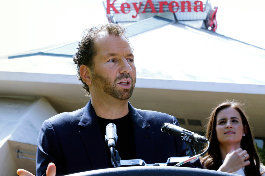 FILE- Michael Rapino, President and CEO of Live Nation Entertainment, speaks during a news conference in Seattle on June 7, 2017. (AP Photo/Ted S. Warren, File)