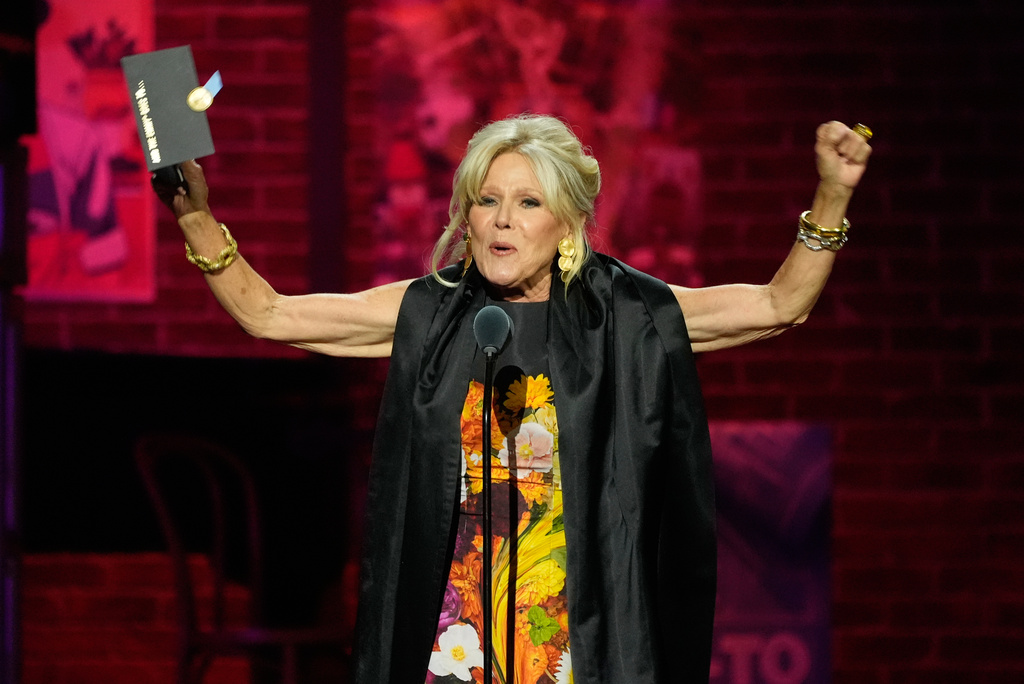 Actor Alley Mills celebrates onstage after winning the award for Outstanding Guest Performance in a Daytime Drama Series for her performance in "General Hospital" during the 52nd Annual Daytime Emmy Awards on Friday, Oct. 17, 2025, at Pasadena Civic Auditorium in Pasadena, Calif. (AP Photo/Chris Pizzello)