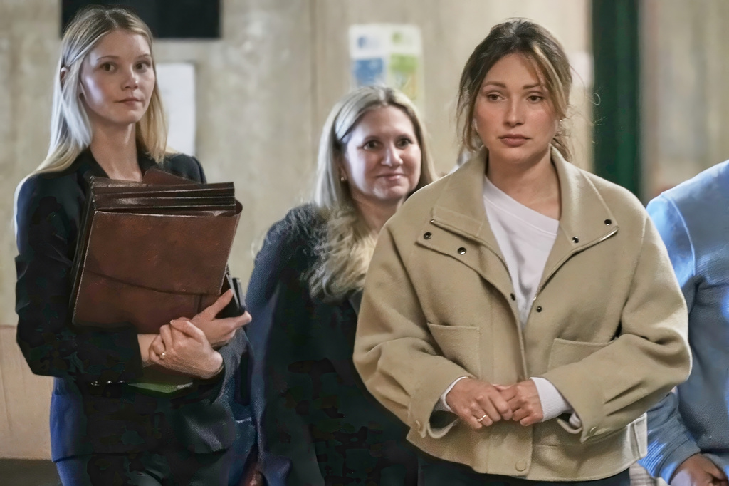 Jessica Mann, right, arrives for Harvey Weinstein's trial in criminal court, followed by Manhattan Assistant District Attorneys Candace White, left, and Nicole Blumberg, in New York, Monday, April 27, 2026. (AP Photo/Richard Drew)