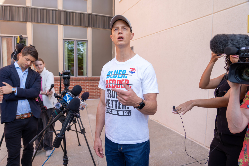 Iowa democratic gubernatorial candidate Rob Sand speaks to media after voting on primary Election Day, Tuesday, June 2, 2026, in Des Moines, Iowa. (AP Photo/Bryon Houlgrave)