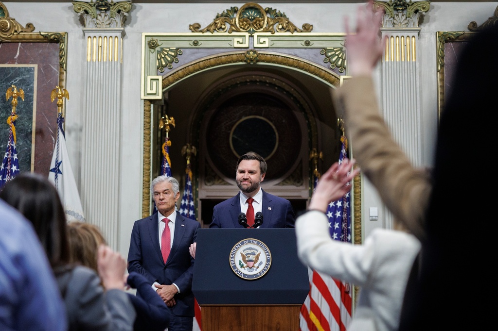 Vice President JD Vance and Administrator for the Centers for Medicare & Medicaid Services Dr. Mehmet Oz take questions from reporters following remarks on the administration's efforts to combat fraud during a news conference in the Old Eisenhower Executive Office Building on the White House campus Wednesday, Feb. 25, 2026, in Washington. (AP Photo/Tom Brenner)