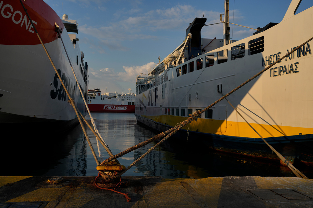 Ferries are docked in Piraeus port near Athens during a nationwide 24-hour strike, as labor unions demand higher wages and the withdrawal of a bill that changes work hours Wednesday, Oct. 1, 2025.(AP Photo/Petros Giannakouris)