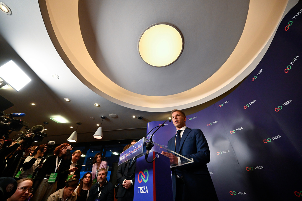 Peter Magyar, leader of the opposition Tisza party, speaks to the media after polls closed, during the Hungarian parliamentary election in Budapest, Hungary, Sunday, April 12, 2026. (AP Photo/Denes Erdos)