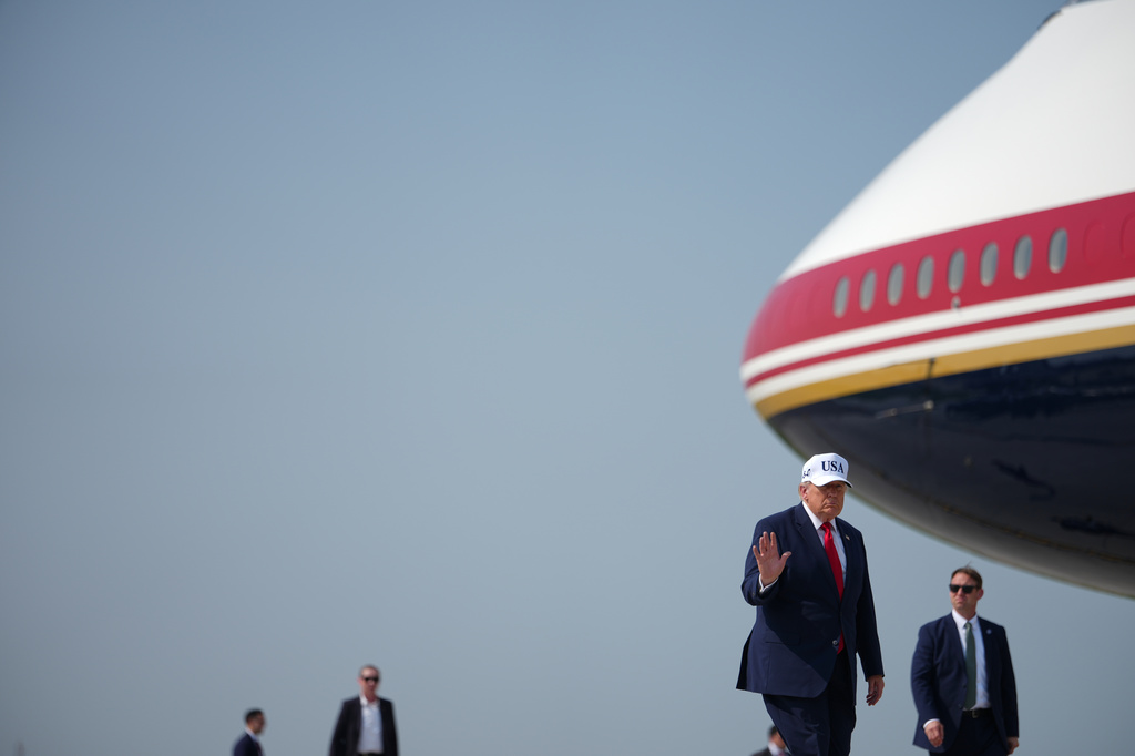 President Donald Trump walks from Marine One to board Air Force One at Bismarck Municipal Airport, Wednesday, July 1, 2026, in Bismarck, N.D. (AP Photo/Julia Demaree Nikhinson)