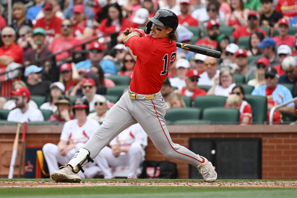Boston Red Sox's Jarren Duran hits a three-RBI double in the fourth inning of a baseball game against the St. Louis Cardinals, Sunday, April 12, 2026, in St. Louis. (AP Photo/Michael Thomas)