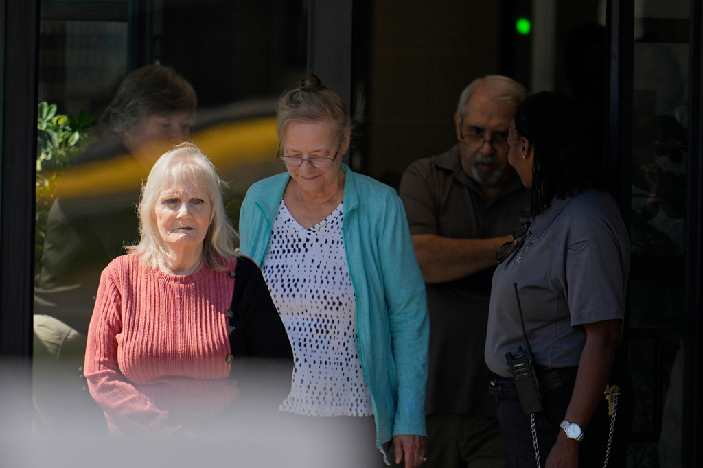 May Martinez, left, mother of murder victim Colleen Slemmer, walks out of Riverbend Maximum Security Institution during a stay of the planned execution of Christa Pike, Wednesday, Sept. 30, 2026, in Nashville, Tenn. (AP Photo/George Walker IV)