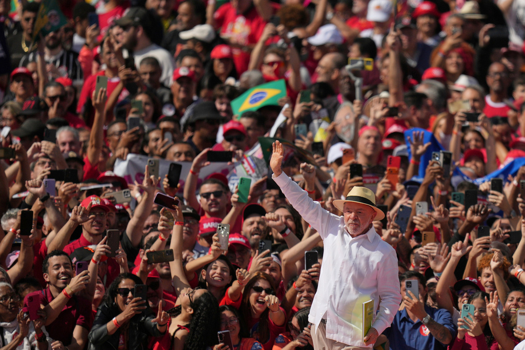 Brazilian President Luiz Inacio Lula da Silva waves to supporters during a presidential election campaign rally in Sao Bernardo do Campo, Sao Paulo state, Brazil, Sunday, Aug. 16, 2026. (AP Photo/Andre Penner)