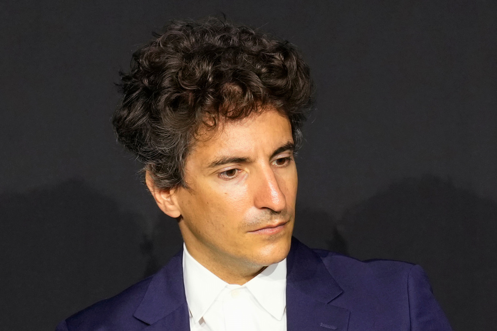 FILE- Prada Group Chief Marketing Officer Lorenzo Bertelli attends the presentation of the Axiom and Prada-designed spacesuit that will be used by NASA from 2026, in Milan, Italy, Wednesday, Oct. 16, 2024. (AP Photo/Antonio Calanni, File)