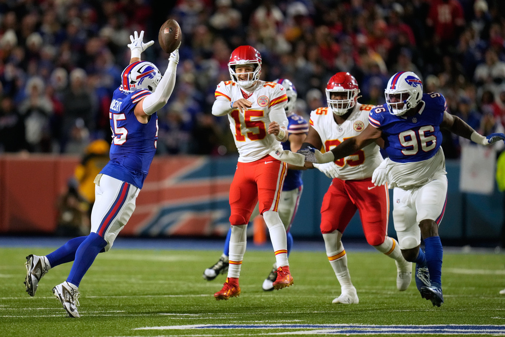 Buffalo Bills defensive end Michael Hoecht (55) tips a pass by Kansas City Chiefs quarterback Patrick Mahomes (15) during the second half of an NFL football game Sunday, Nov. 2, 2025, in Orchard Park. N.Y. (AP Photo/Sue Ogrocki)