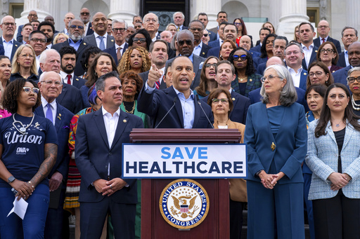 House Minority Leader Hakeem Jeffries, D-N.Y., center, flanked by Rep. Pete Aguilar, D-Calif., left, and Rep. Katherine Clark, D-Mass., arrives to speak on the steps of the Capitol to insist that Republicans include an extension of expiring health care benefits as part of a government funding compromise, in Washington, Tuesday, Sept. 30, 2025. (AP Photo/J. Scott Applewhite) House Minority Leader Hakeem Jeffries, D-N.Y., center, flanked by Rep. Pete Aguilar, D-Calif., left, and Rep. Katherine Clark, D-Mass., arrives to speak on the steps of the Capitol to insist that Republicans include an extension of expiring health care benefits as part of a government funding compromise, in Washington, Tuesday, Sept. 30, 2025. (AP Photo/J. Scott Applewhite)