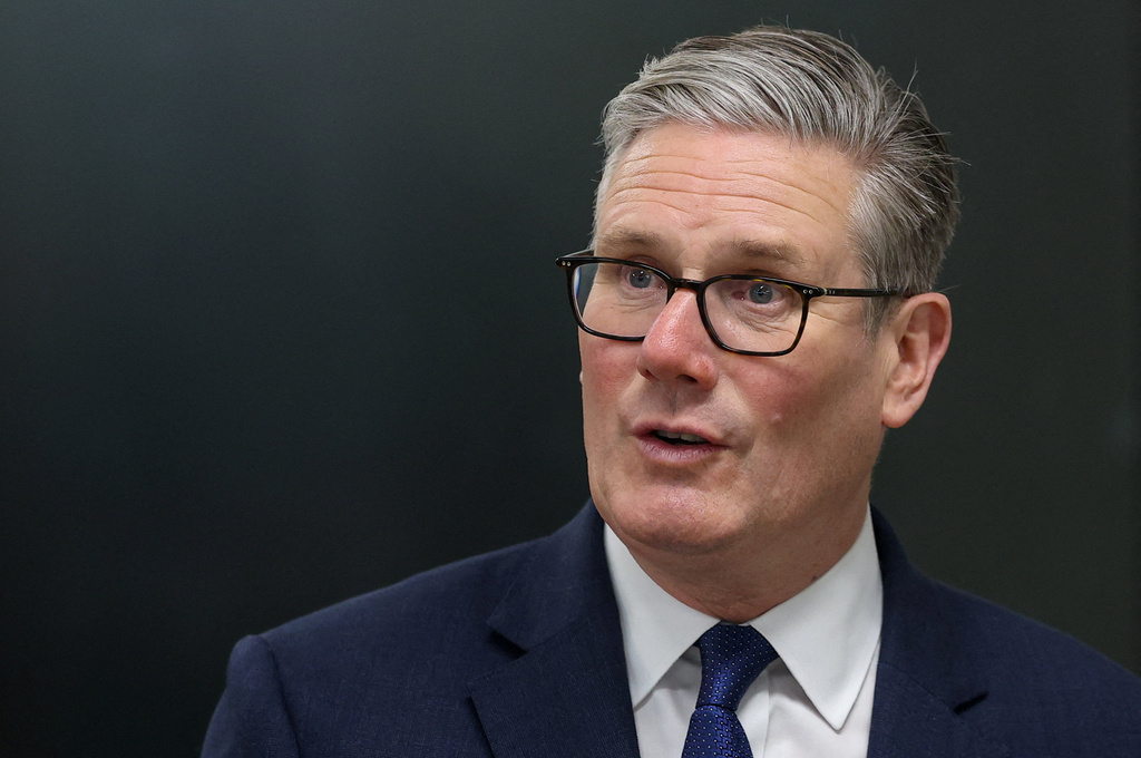 Britain's Prime Minister Keir Starmer meets construction apprentices during a visit to London South Bank Technical College in London, Tuesday, May 12, 2026. (Toby Melville/Pool Photo via AP)