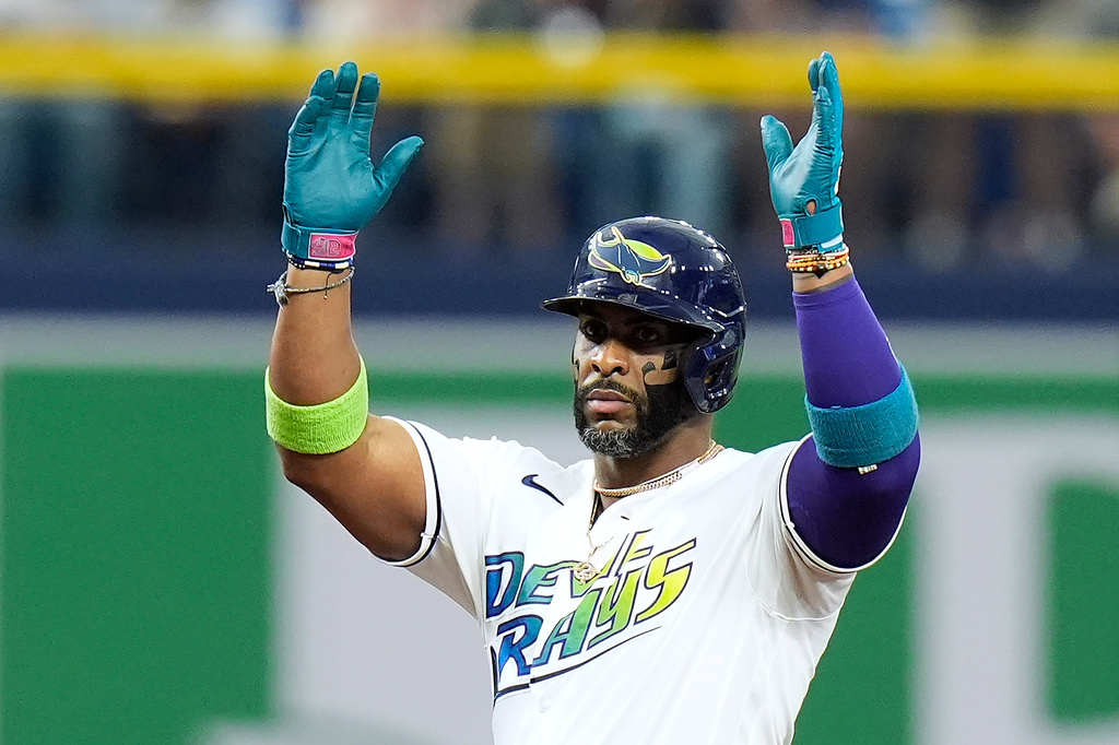 Tampa Bay Rays' Yandy Díaz celebrates his double off Cleveland Guardians pitcher Tanner Bibee during the fifth inning of a baseball game Saturday, July 25, 2026, in St. Petersburg, Fla. (AP Photo/Chris O'Meara)