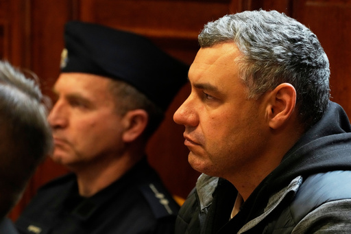 CAPTION CORRECTS THE SPELLING - Ukrainian defendant Volodymyr Zhuravlov listens as a judge announces the decision not to allow for extradition to Germany in courtroom of Warsaw's Regional Court in Warsaw, Poland, Friday, Oct. 17, 2025. (AP Photo/Czarek Sokolowski) CAPTION CORRECTS THE SPELLING - Ukrainian defendant Volodymyr Zhuravlov listens as a judge announces the decision not to allow for extradition to Germany in courtroom of Warsaw's Regional Court in Warsaw, Poland, Friday, Oct. 17, 2025. (AP Photo/Czarek Sokolowski)