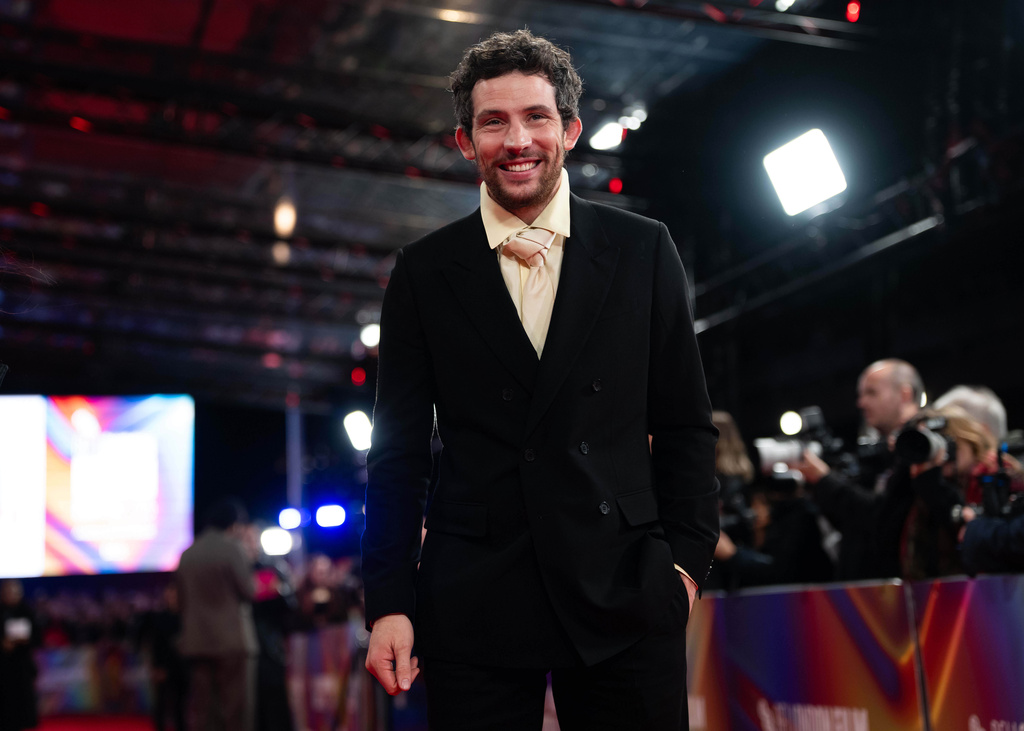 Josh O' Connor poses upon arrival at the premiere of the film "The Mastermind" during the London film festival in London, Monday, Oct. 13, 2025. (Photo by Scott A Garfitt/Invision/AP)
