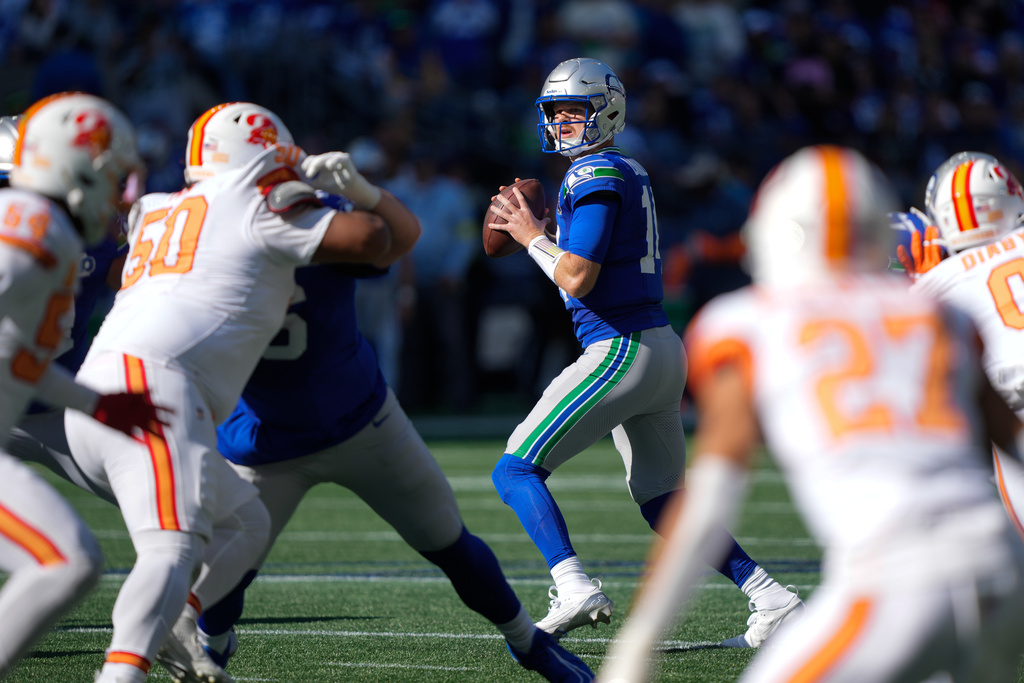 Seattle Seahawks quarterback Sam Darnold (14) looks to throw during the first half of an NFL football game against the Tampa Bay Buccaneers, Sunday, Oct. 5, 2025, in Seattle. (AP Photo/Stephen Brashear)