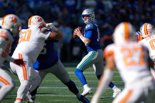 Seattle Seahawks quarterback Sam Darnold (14) looks to throw during the first half of an NFL football game against the Tampa Bay Buccaneers, Sunday, Oct. 5, 2025, in Seattle. (AP Photo/Stephen Brashear) Seattle Seahawks quarterback Sam Darnold (14) looks to throw during the first half of an NFL football game against the Tampa Bay Buccaneers, Sunday, Oct. 5, 2025, in Seattle. (AP Photo/Stephen Brashear)