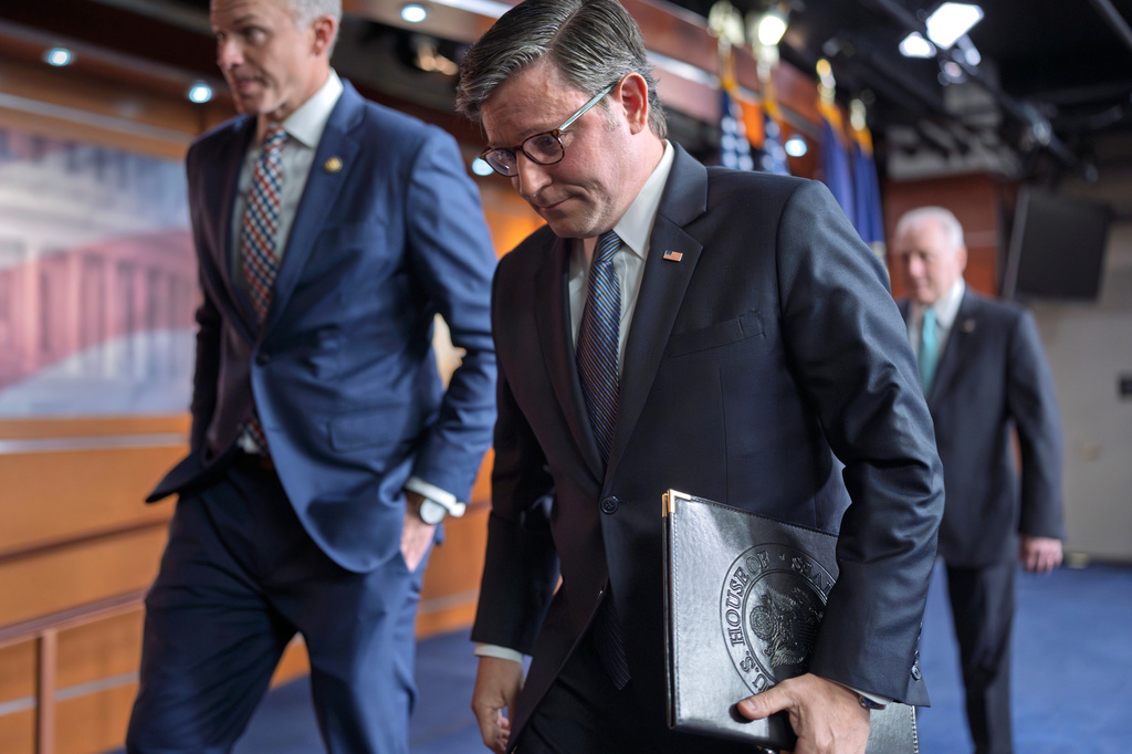 Speaker of the House Mike Johnson, R-La., and House GOP leaders departs a news conference after primary elections that affirmed President Donald Trump's dominance of the Republican Party, at the Capitol in Washington, Wednesday, May 20, 2026. (AP Photo/J. Scott Applewhite)