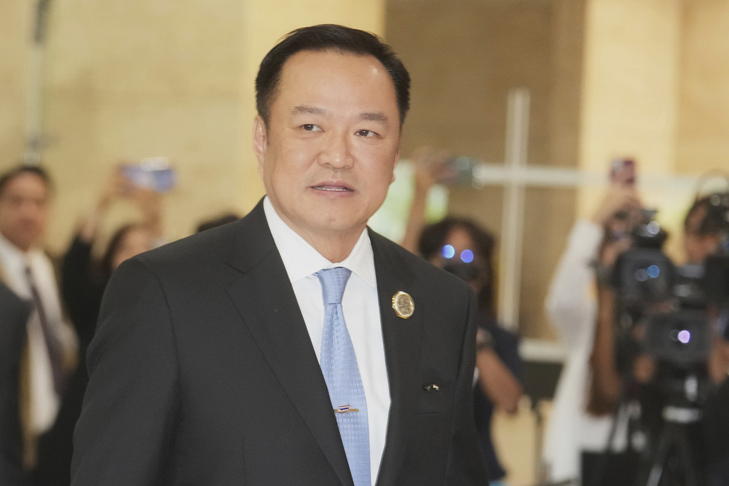 FILE- Leader of Bhumjai Thai Party Anutin Charnvirakul arrives at Parliament in Bangkok, Thailand, Friday, Sept. 5, 2025. (AP Photo/Sakchai Lalit, File)