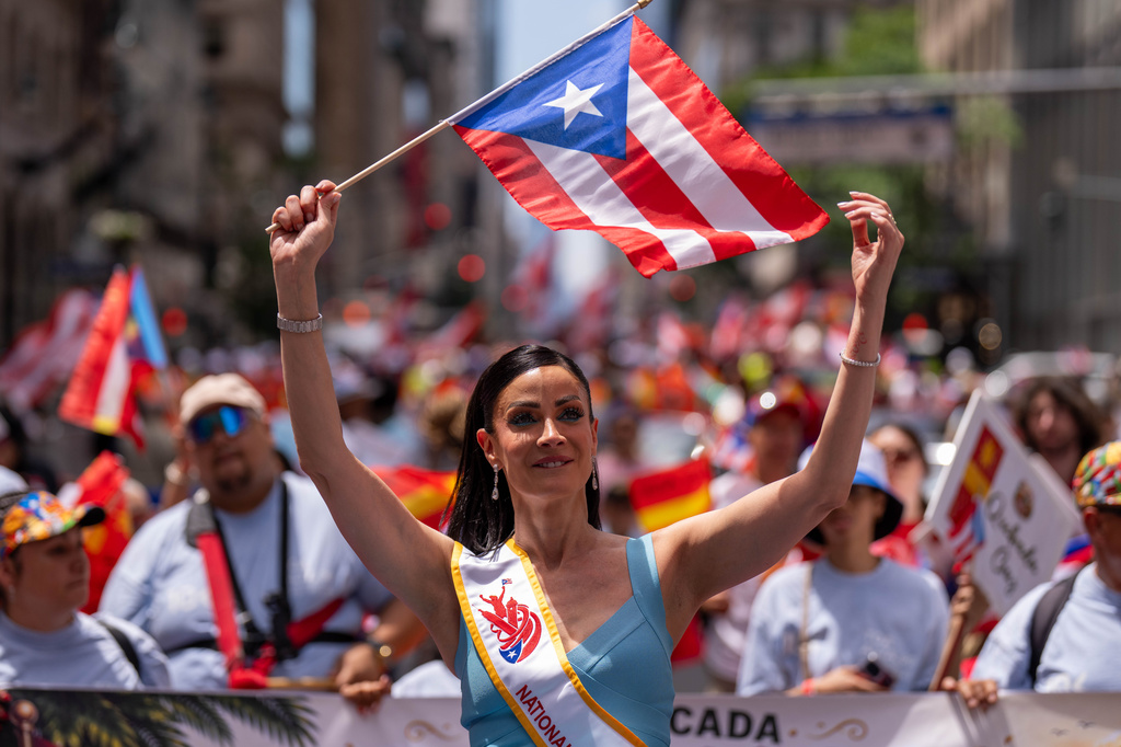 Dayanara Torres takes part in the National Puerto Rican Day Parade, Sunday, June 14, 2026 in New York. (AP Photo/Adam Gray)