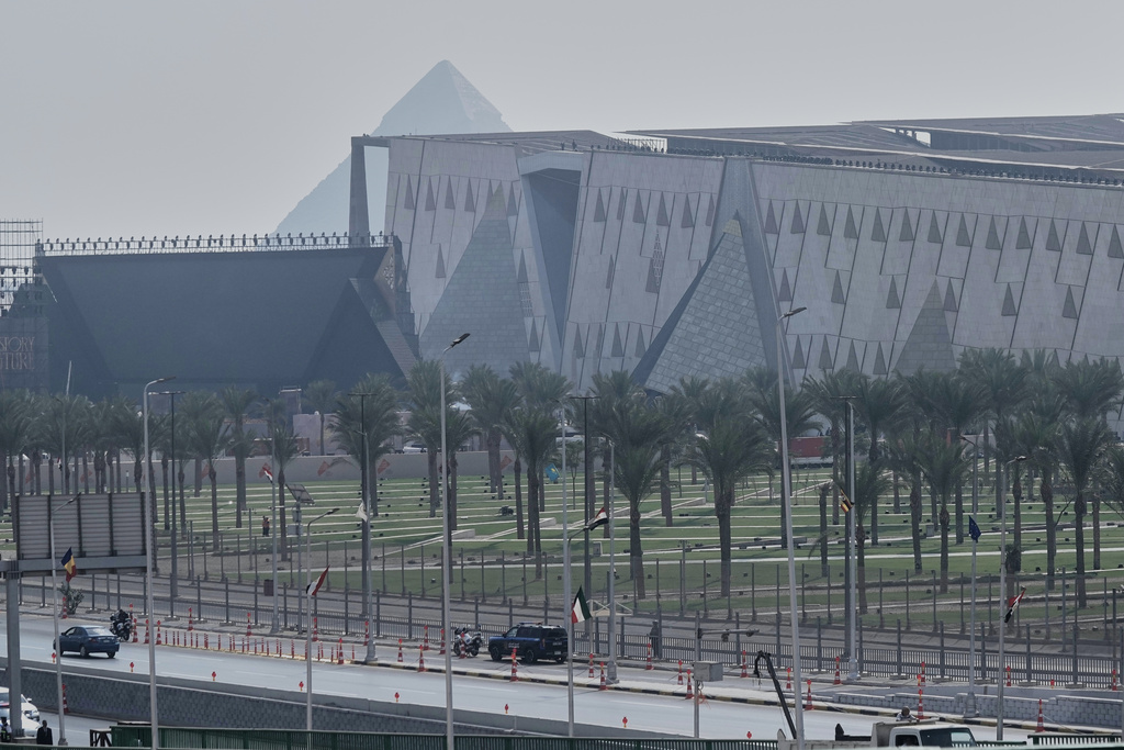 Police vehicles stand alert as they guard ahead of the opening of the Grand Egyptian Museum in Giza, Egypt, Saturday, Nov. 1, 2025. (AP Photo/Amr Nabil)