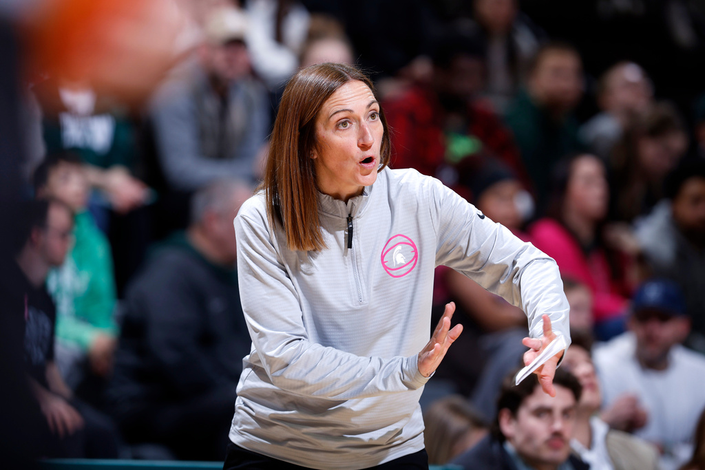 Michigan State coach Robyn Fralick gives instructions during the second half of an NCAA college basketball game against Michigan State, Wednesday, Feb. 11, 2026, in East Lansing, Mich. (AP Photo/Al Goldis)