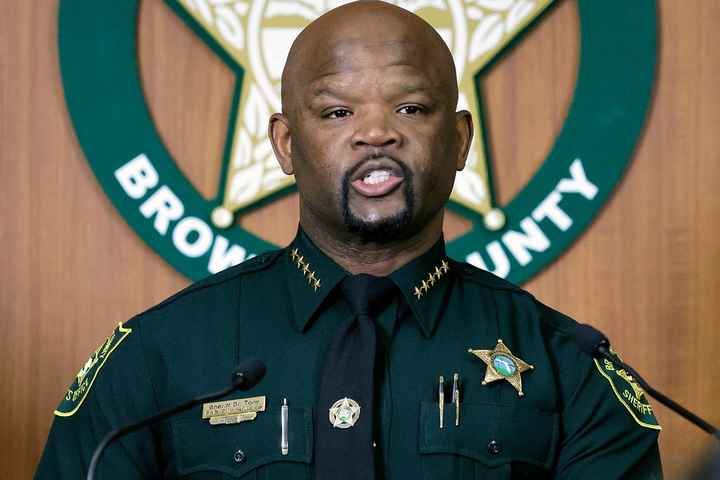 Broward Sheriff Gregory Tony and members of the Broward Sheriff's Office Internal Affairs Unit hold a news conference at the BSO Public Safety Building in Fort Lauderdale, Fla., on Friday, Sept. 12, 2025, about police misconduct in the Tamarac triple homicide case. (Mike Stocker/South Florida Sun-Sentinel via AP)