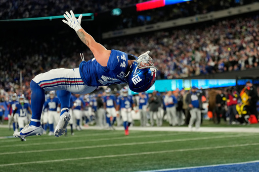 New York Giants' Cam Skattebo reacts after a touchdown during the second half of an NFL football game against the Philadelphia Eagles Thursday, Oct. 9, 2025, in East Rutherford, N.J. (AP Photo/Seth Wenig) New York Giants' Cam Skattebo reacts after a touchdown during the second half of an NFL football game against the Philadelphia Eagles Thursday, Oct. 9, 2025, in East Rutherford, N.J. (AP Photo/Seth Wenig)