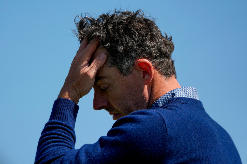 Rory McIlroy, of Northern Ireland, leaves the green on the 18th hole after his first round of the Masters golf tournament at the Augusta National Golf Club, Thursday, April 9, 2026, in Augusta, Ga. (AP Photo/Matt Slocum)