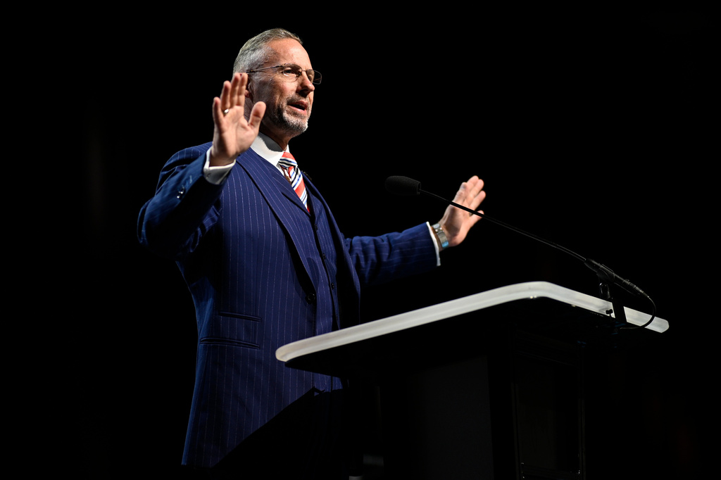 Clint Pressley, president of the Southern Baptist Convention, addresses attendees during the annual meeting, Tuesday, June 9, 2026, in Orlando, Fla. (AP Photo/Phelan M. Ebenhack)