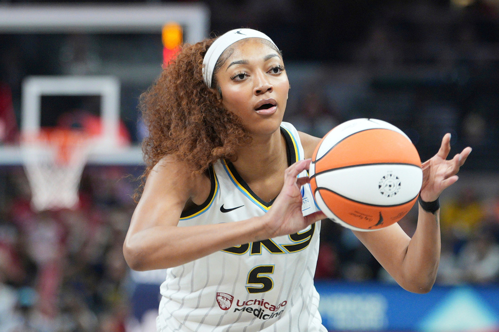 FILE - Chicago Sky forward Angel Reese (5) makes a pass during a WNBA basketball game against the Indiana Fever in Indianapolis, Saturday, May 17, 2025. (AP Photo/AJ Mast, File)