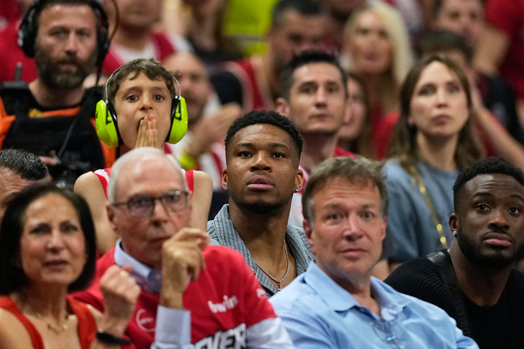 Giannis Antetokounmpo of the Milwaukee Bucks, center, looks on during the Euroleague final basketball match between Olympiacos and Real Madrid in Athens, Greece, Sunday, May 24, 2026. (AP Photo/Thanassis Stavrakis)
